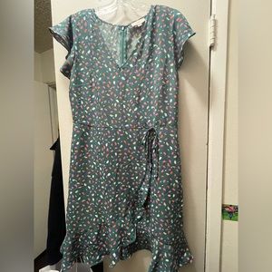 Teal printed LOFT Outlet dress. Mock wrap dress. Woven. Zips in the back.